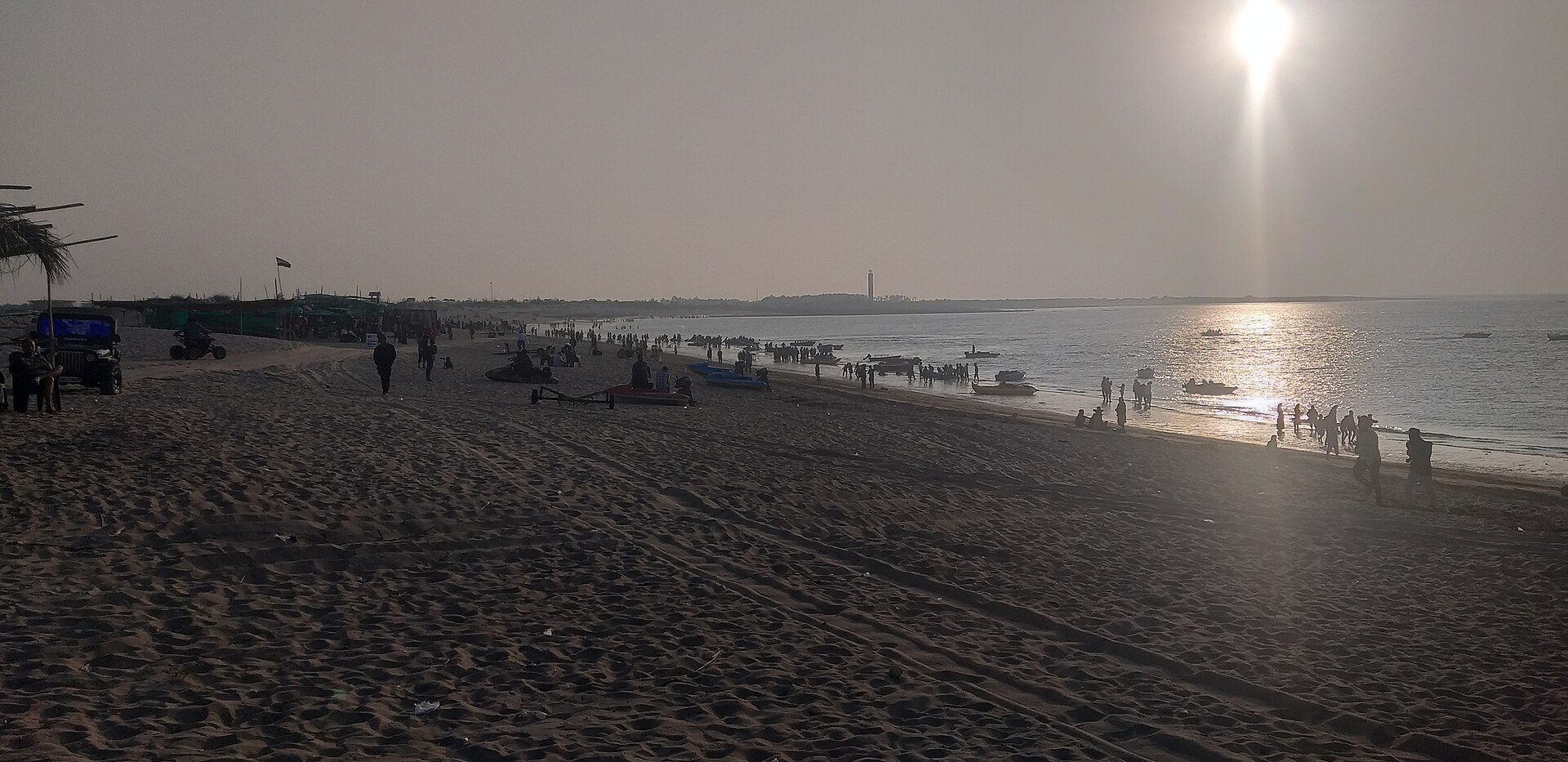 Pristine white sand coastline and calm azure waters at Blue Flag certified Shivrajpur Beach in Devbhumi Dwarka, Gujarat