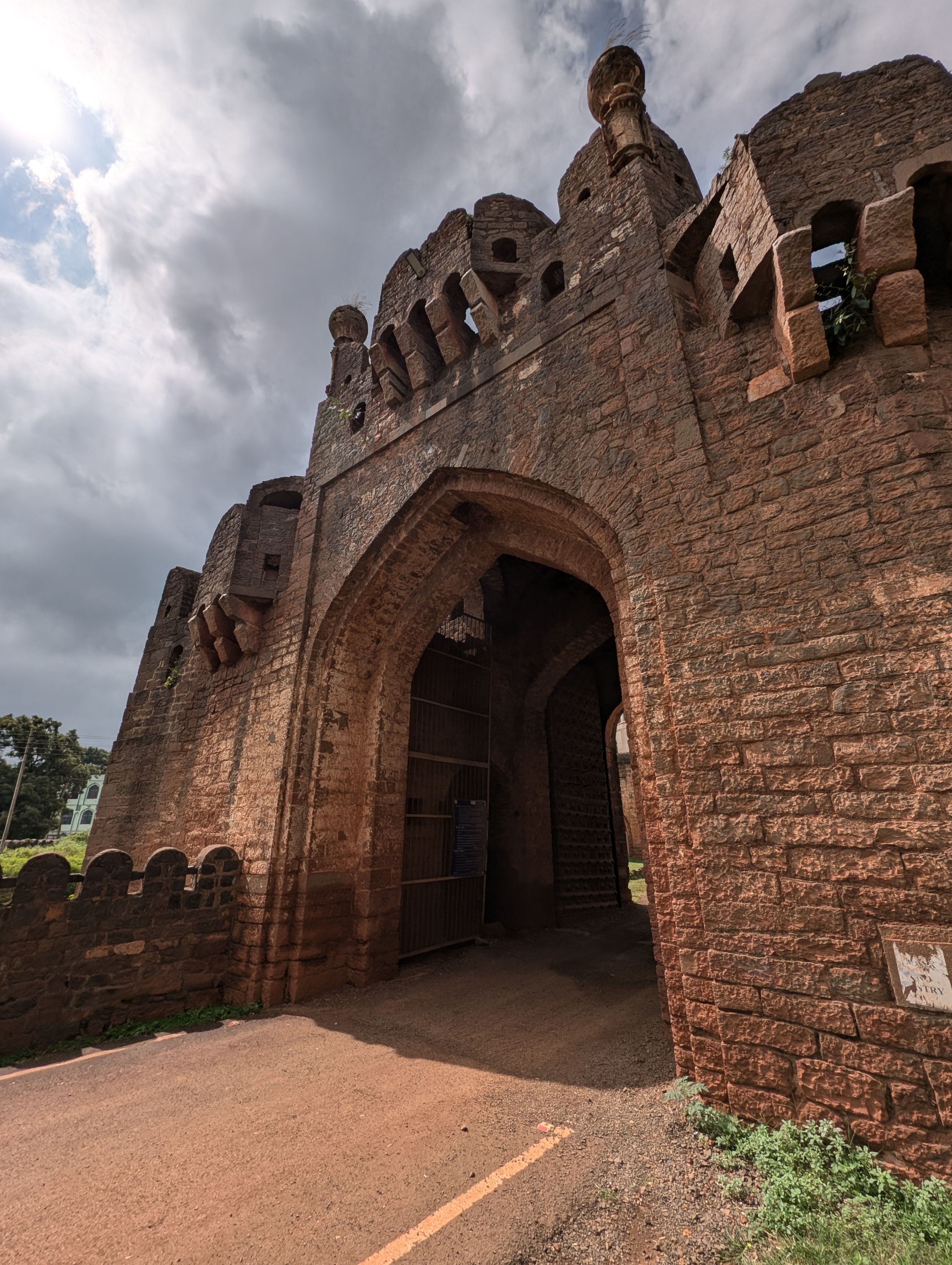 View of the massive stone walls and entrance gateway of Bidar Fort in Karnataka